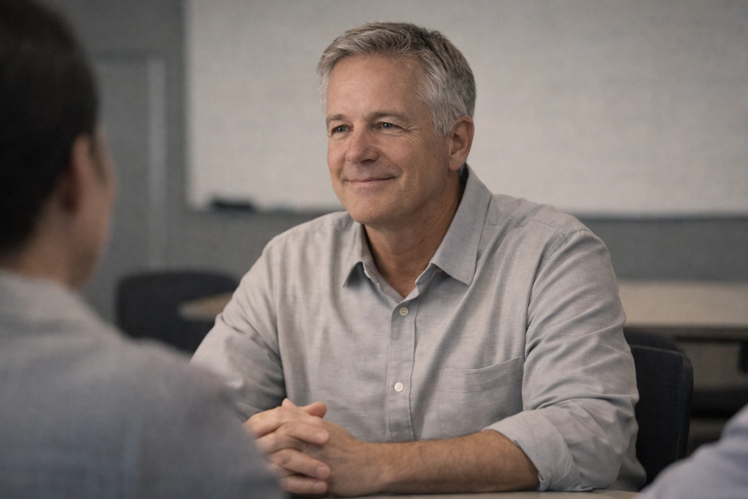 Man in a meeting without anxiety about bathrooms